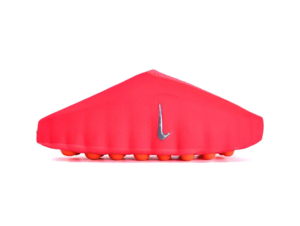 Red, rubber shoe with textured orange sole and silver logo on side.