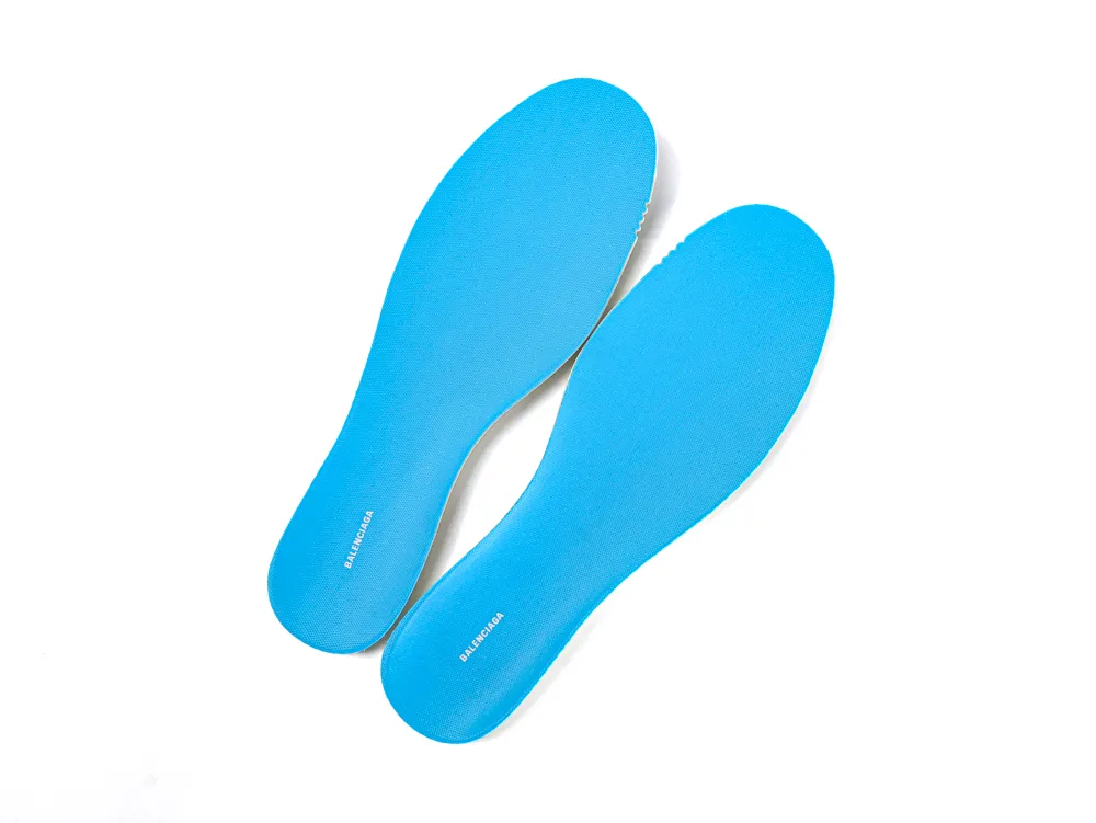 Blue foam insoles with printed text, designed for comfort and support in shoes.