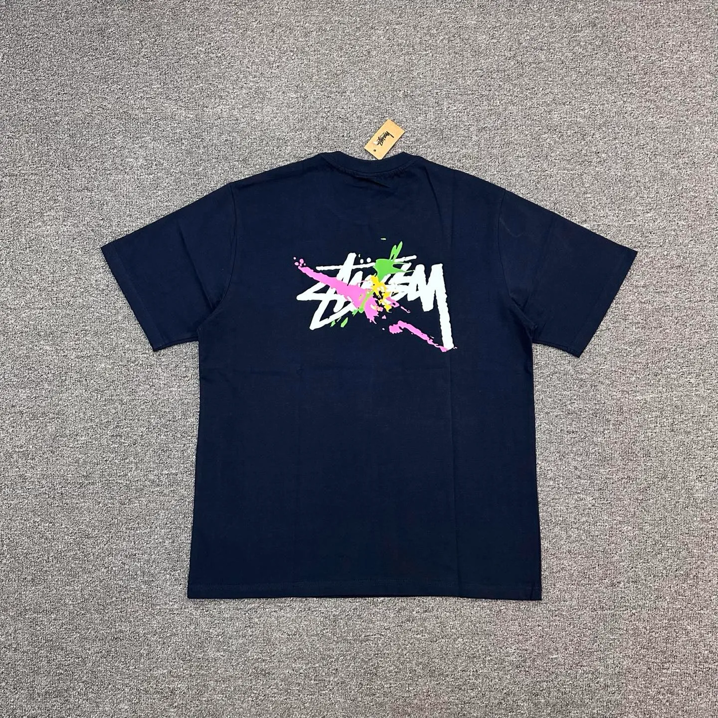 Back of Stussy Colorful Graffiti Logo T-Shirt Color Dark Blue