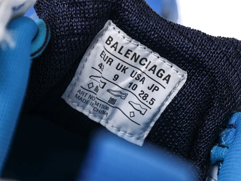 Close-up of a sneaker's blue textile upper with a white fabric label.