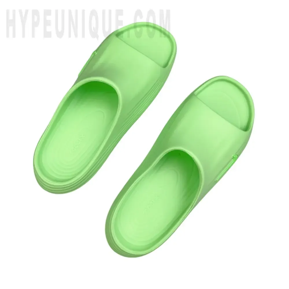 A pair of the green shoes