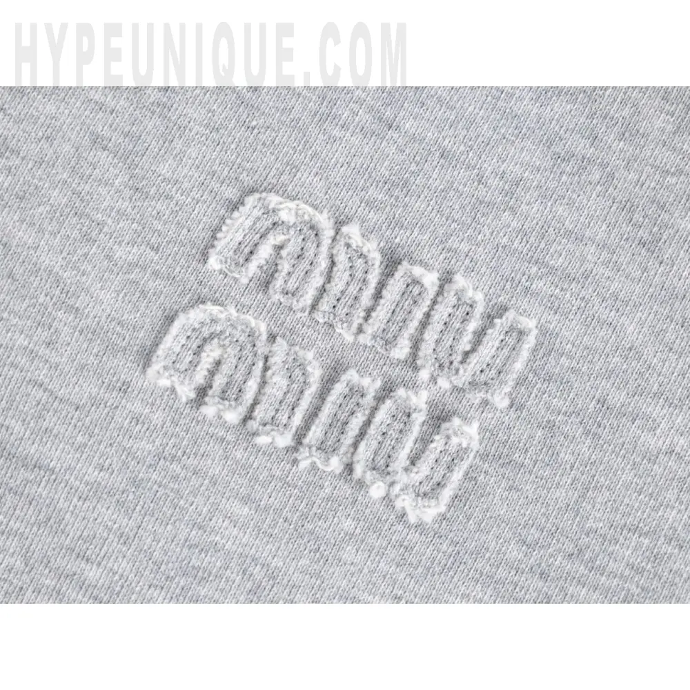 Embroidered graphic on the front of the garment