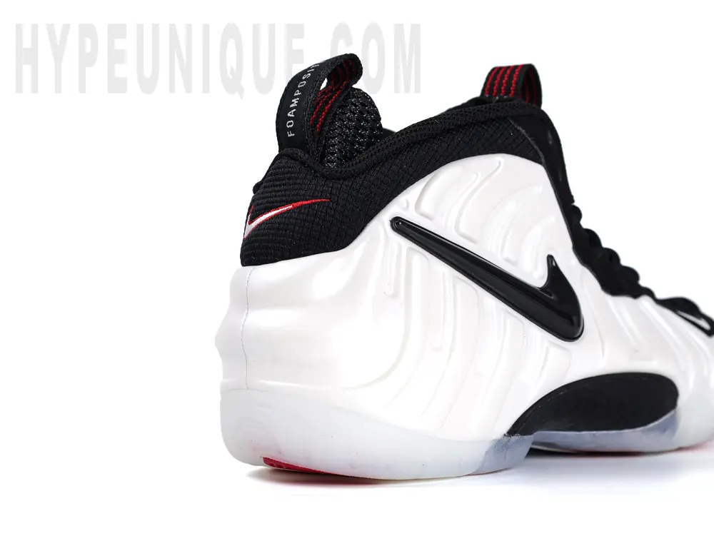 The Nike Air Foamposite Pro Pearl (2025) heel viewed from the rear right side.