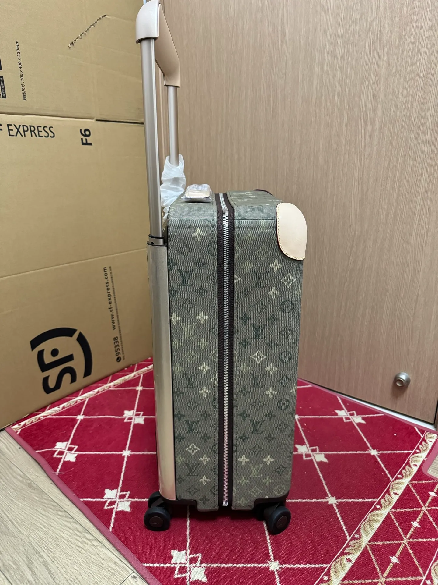 Monogram Khaki Green Horizon Rolling Carry-On Suitcase Side View With Zipper