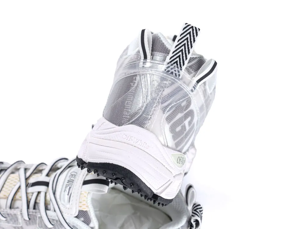 White and gray sneaker with mesh material, featuring black and white patterned pull-loop.