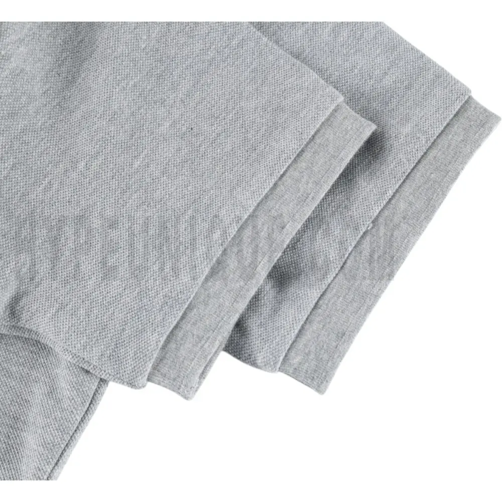 The sleeves of the gray clothes
