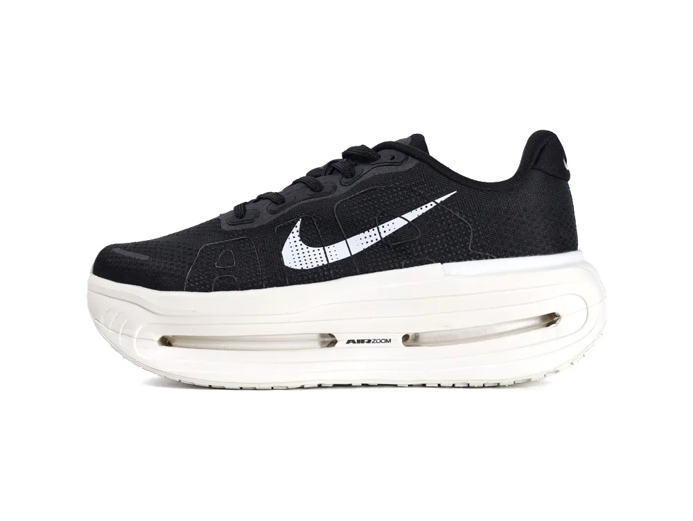 Black mesh sneaker with white rubber sole and logo detail on the side.