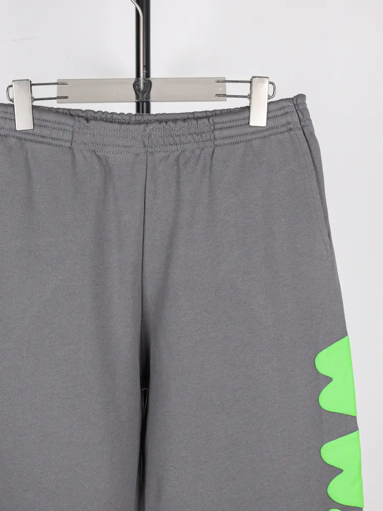 Displayed in the crotch area.