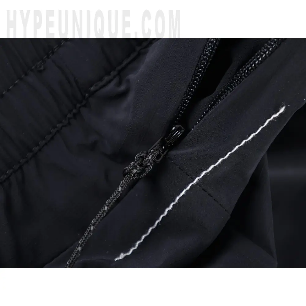 The zipper on the shorts