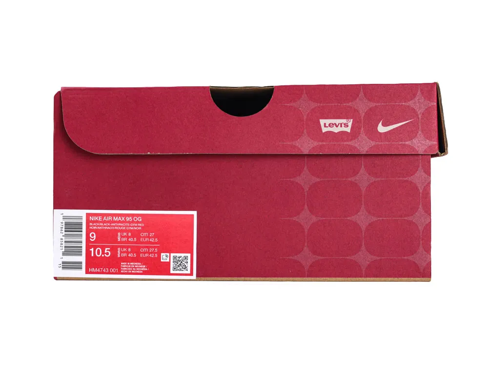 Red cardboard shoe box featuring logos and label on the side.