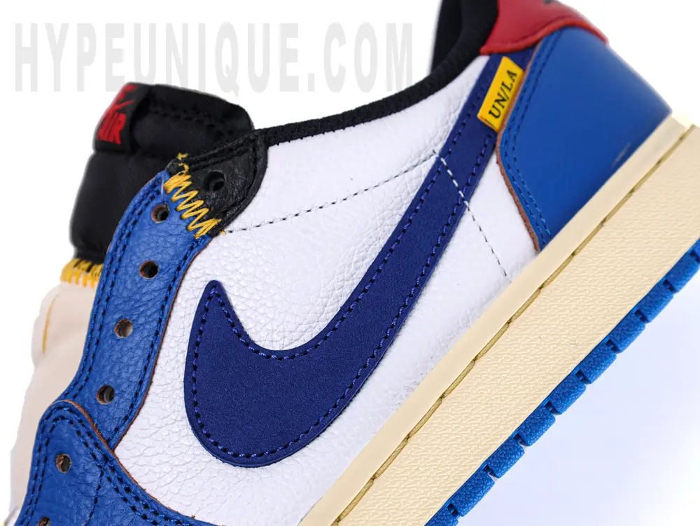 The Union LA Jordan 1 Retro Low NRG ‘Storm Blue’ features a black collar and white insole.