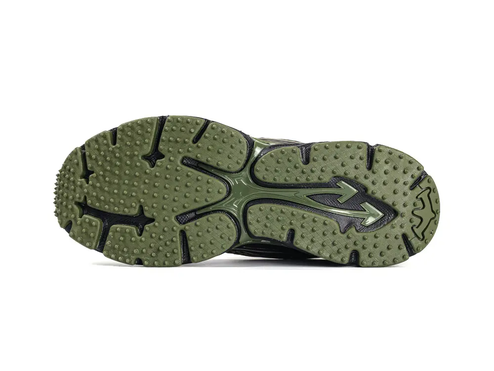 Bottom view of Off-White Black Be Right Back trainer showing green rubber outsole pattern