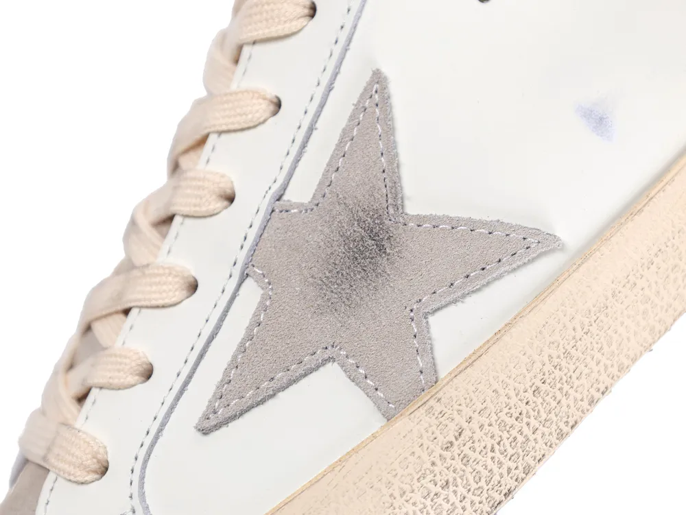 Grey suede star detail on white Golden Goose sneaker
