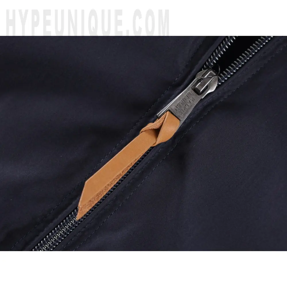 The zipper on the clothes.