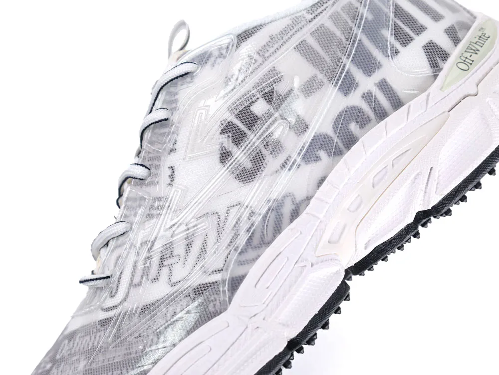 White and gray sneaker with translucent material and black textured rubber sole.