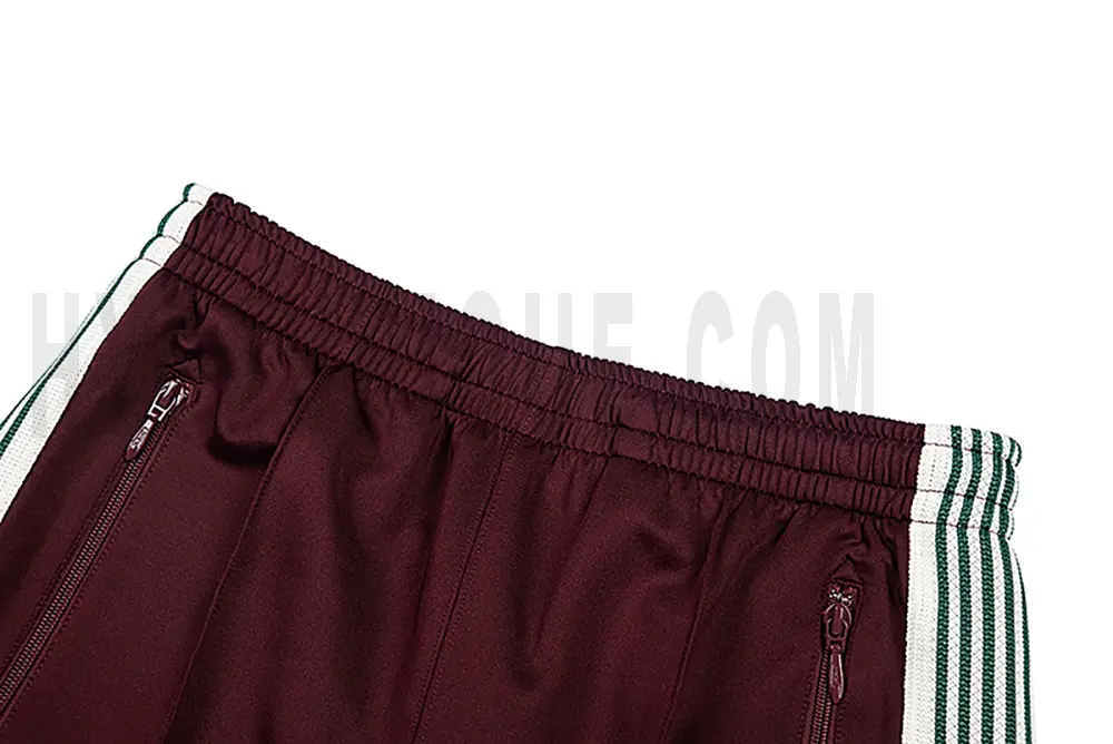 Back detail view of the red pants.