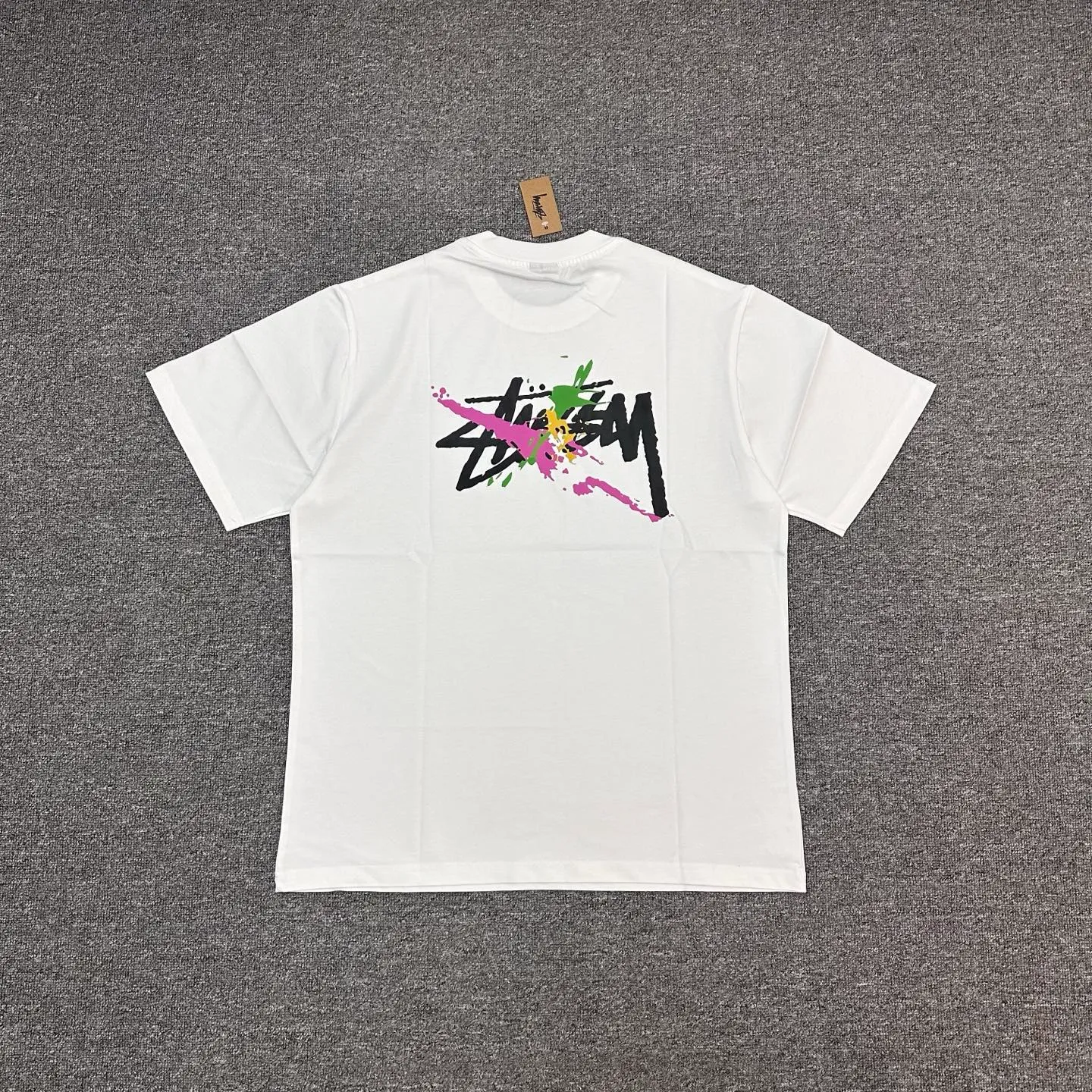 Back of Stussy Colorful Graffiti Logo T-Shirt Color White