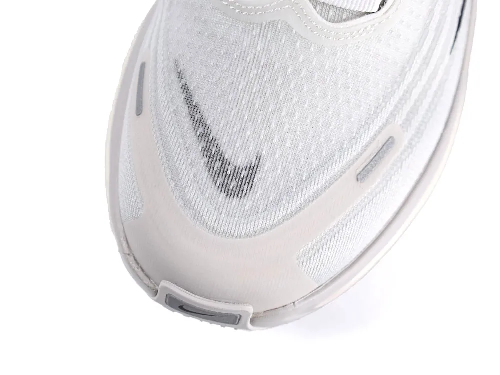 White mesh sneaker upper with gray and black accents on the toe.