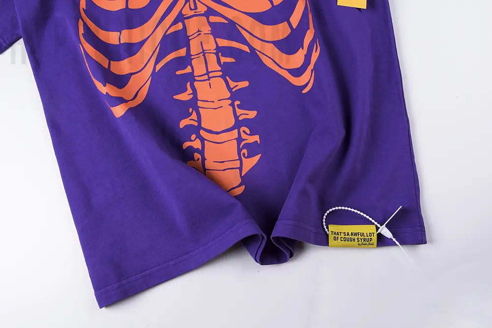 Back hem of the blue That’s A Awful Lot of Cough Syrup Skull Ribs T-shirt.