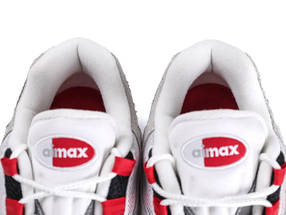 White and red sneakers featuring mesh and suede materials with "aimax" branding on tongue.