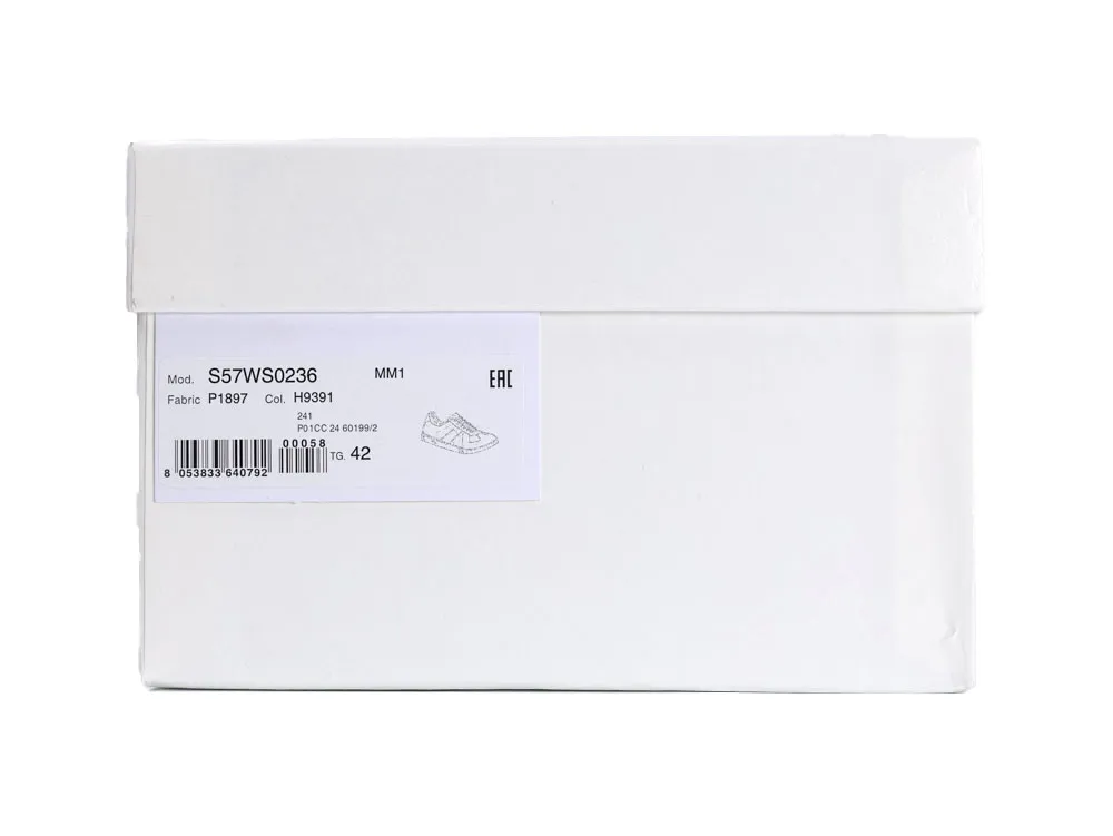 White cardboard shoe box with product label and barcode on the side.