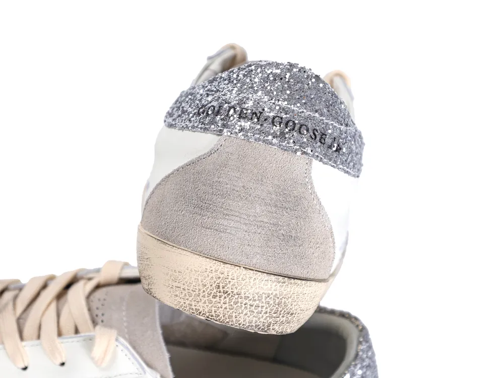 Rear heel view of Golden Goose sneaker with silver glitter heel tab