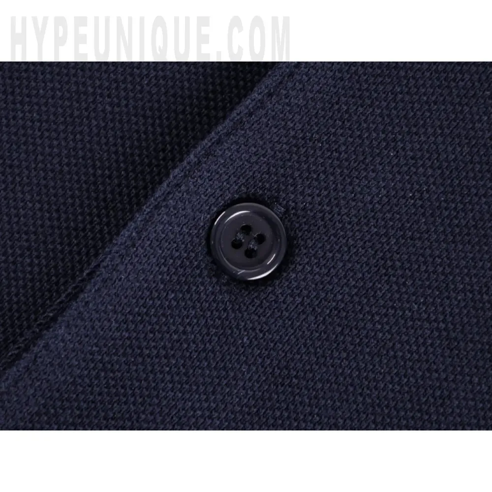 Close-up of button detail on the clothes