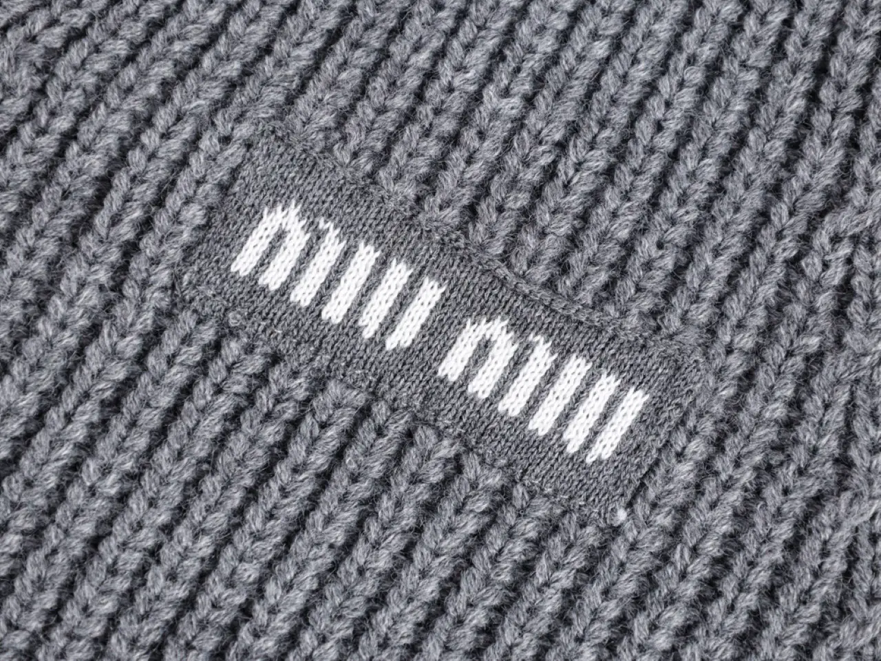 the logo on the left chest