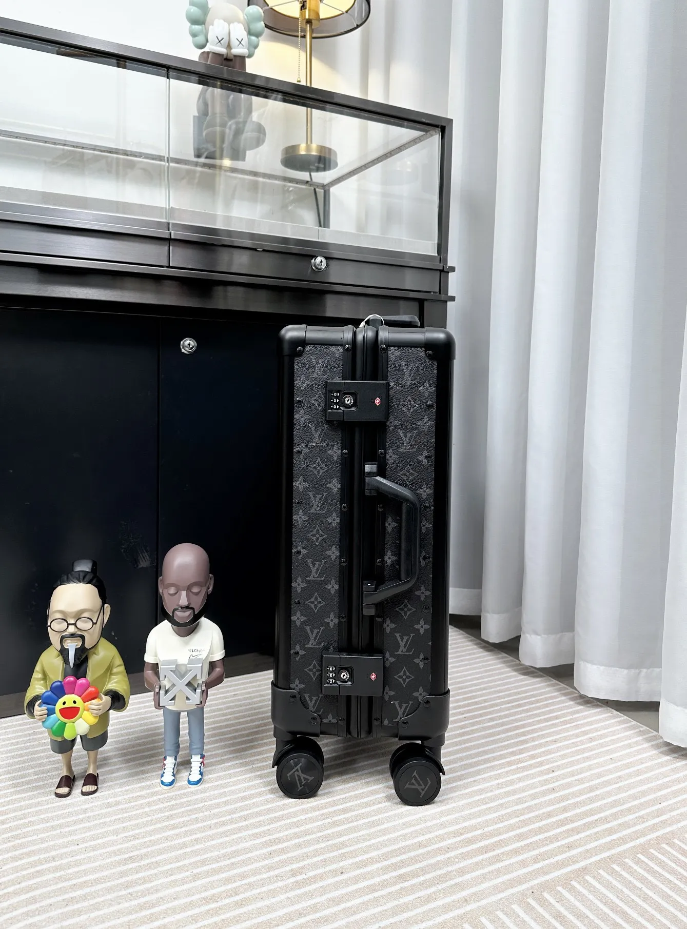 Black monogram luggage side handle and locks