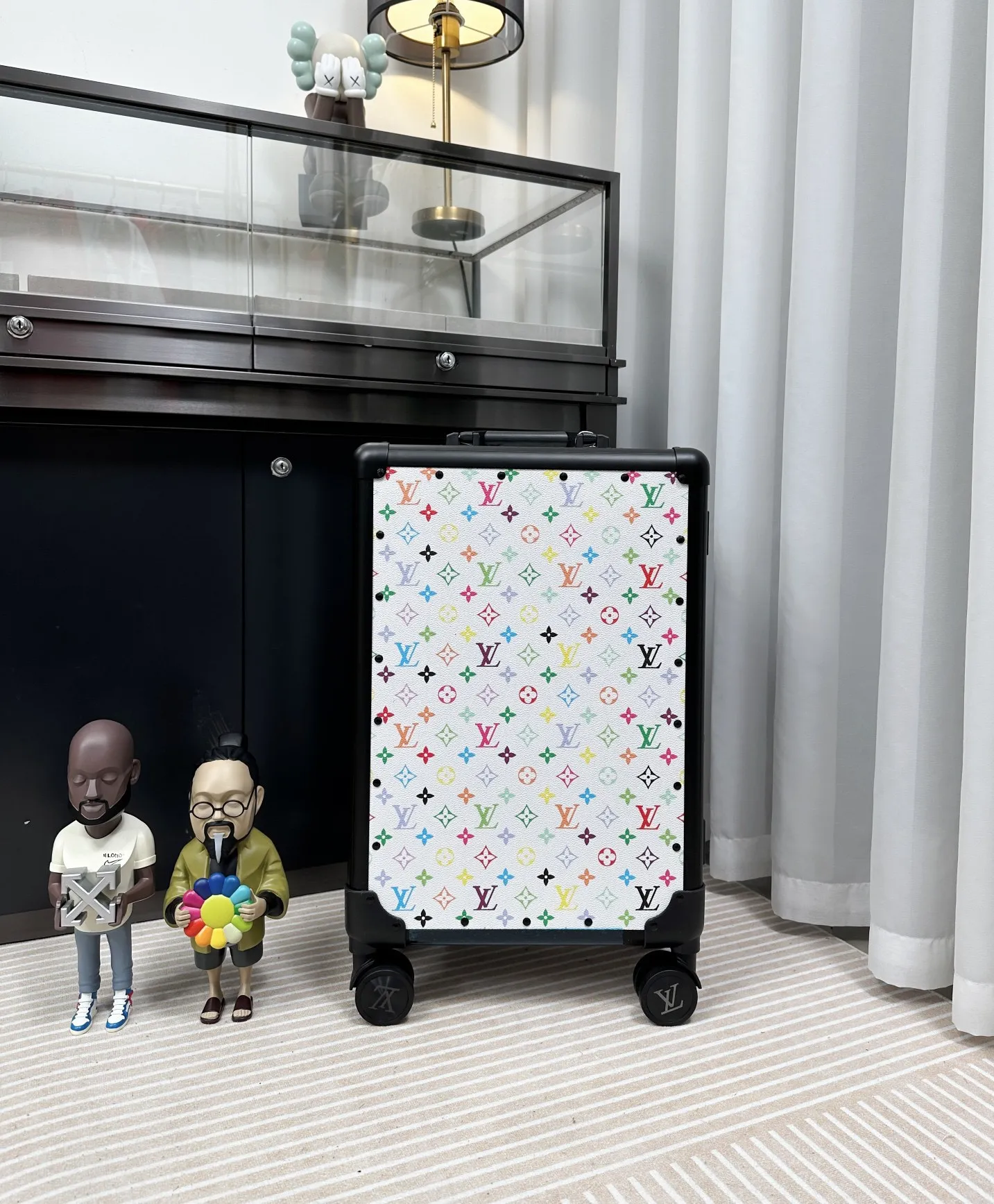 Multicolor monogram rolling travel luggage front view