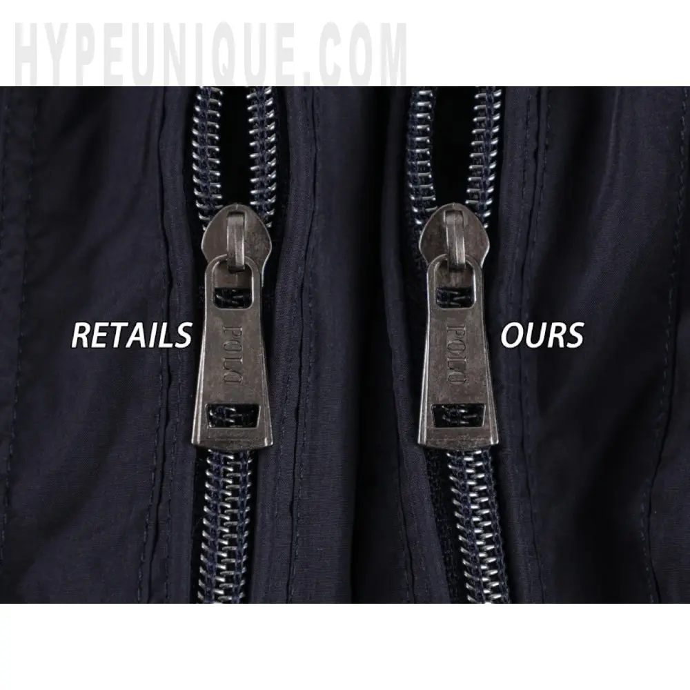 The zipper on the clothes.