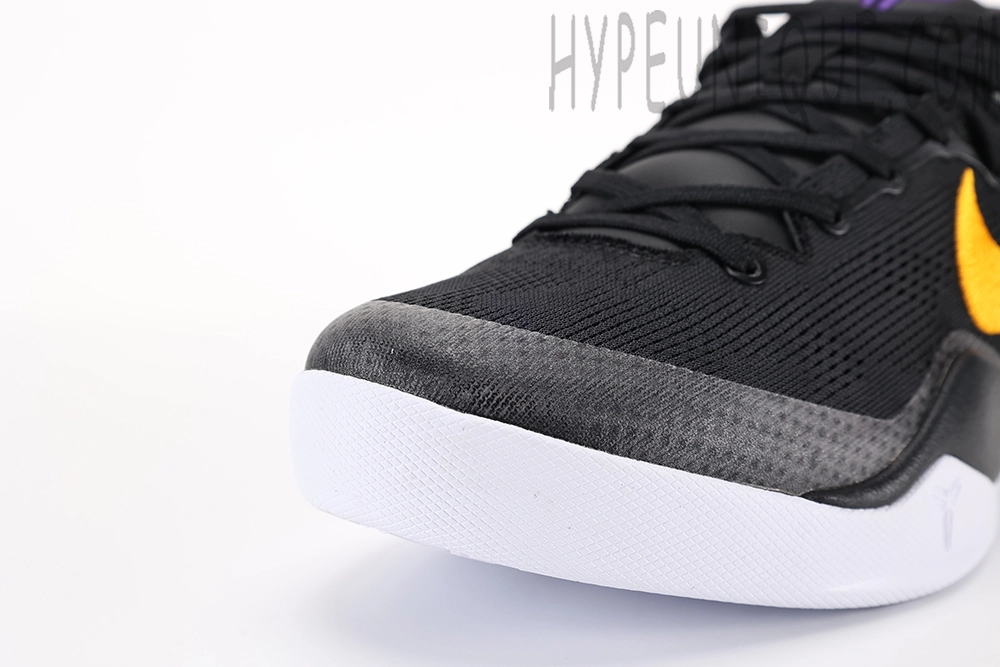 a black and yellow shoe