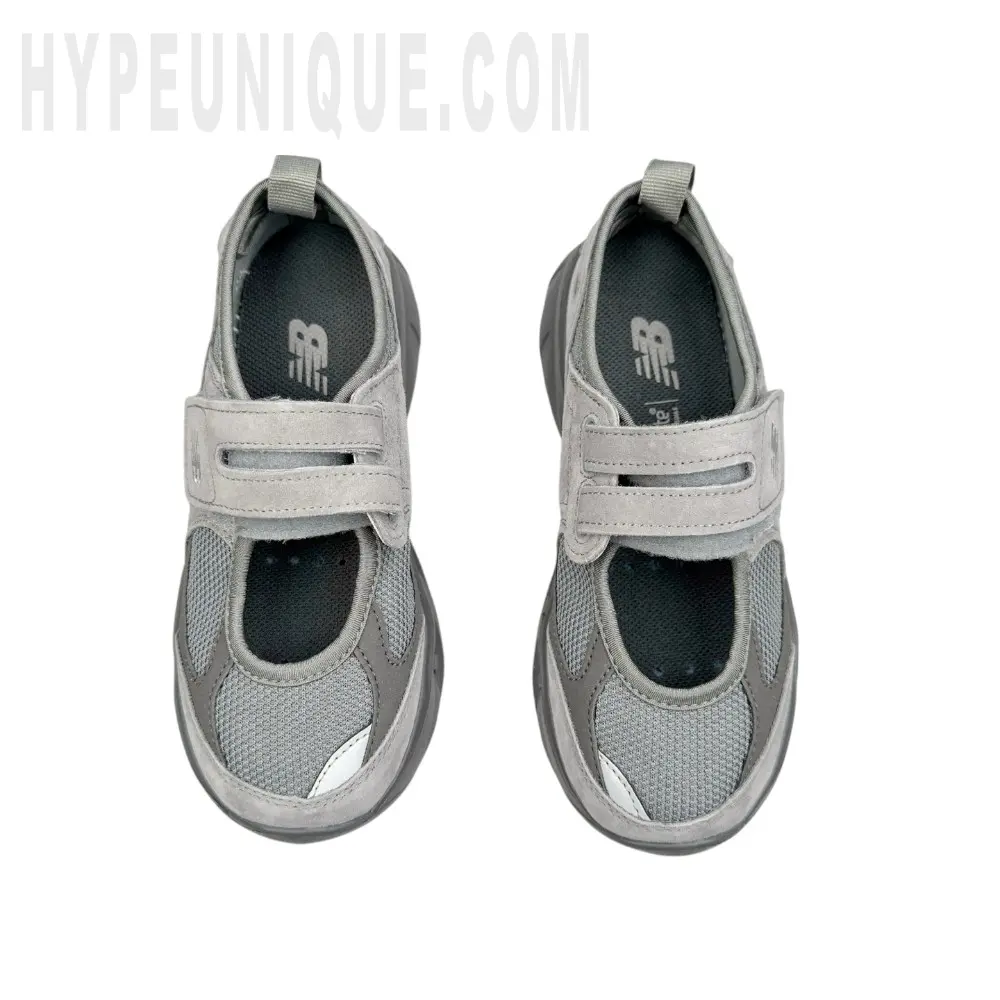 A pair of the gray shoes