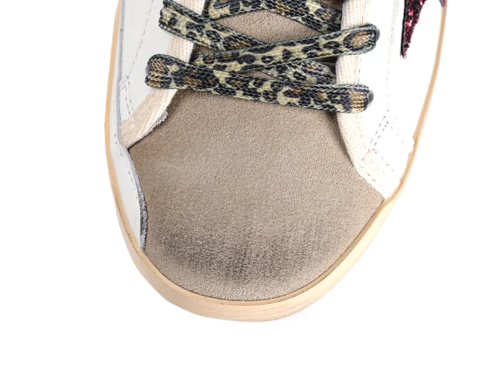 Grey suede toe box of Golden Goose sneaker with leopard print laces