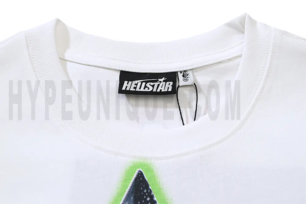 Close-up of the T-shirt's neckline tag, showcasing wash care instructions and brand details in a fashion design.
