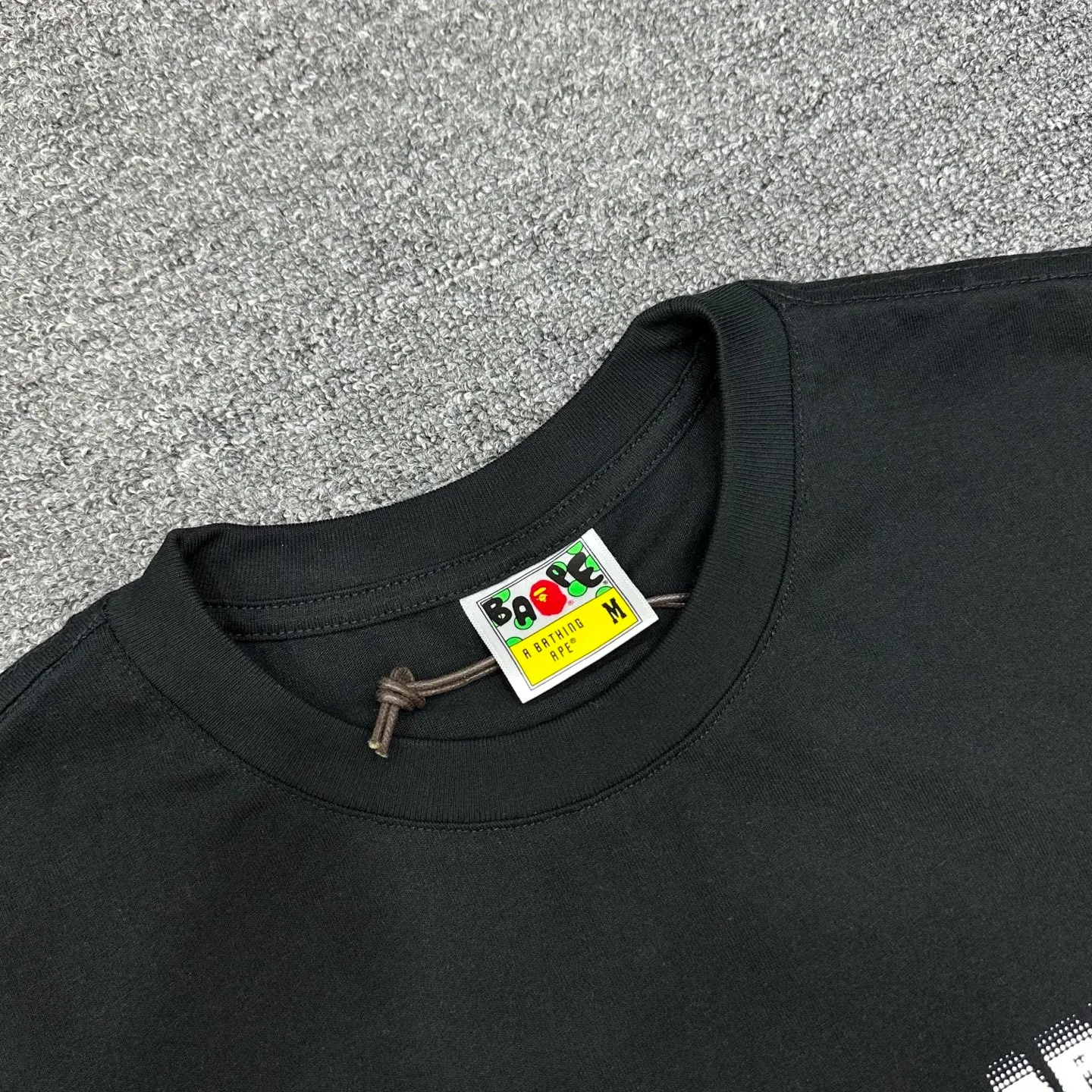 Neckline with visible Brand Tag