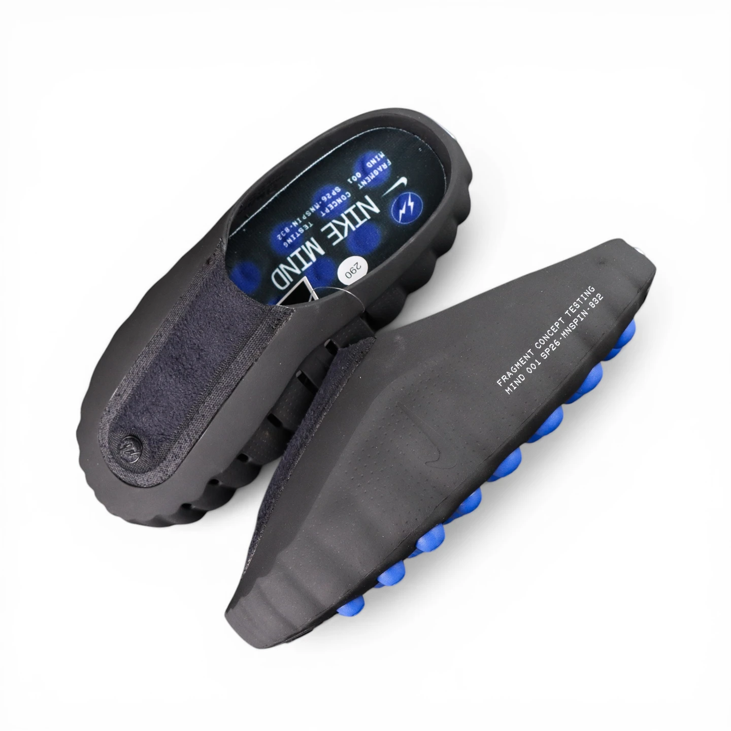 Black and blue rubber slippers with textured sole and soft inner lining.