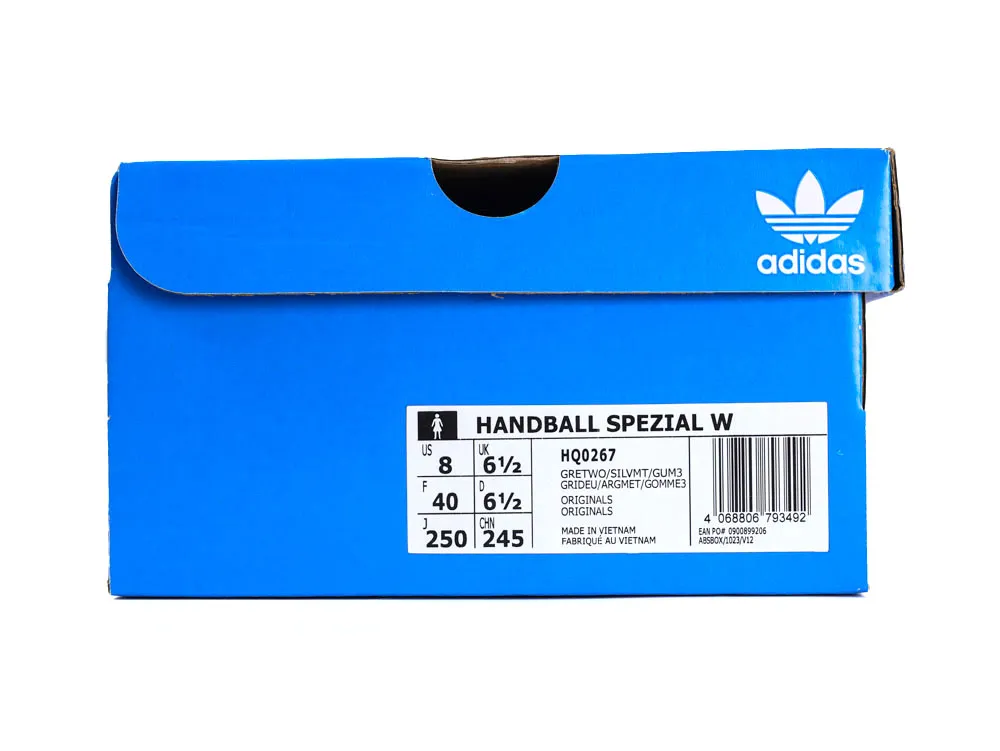 Blue cardboard shoe box with a printed label and adidas branding.