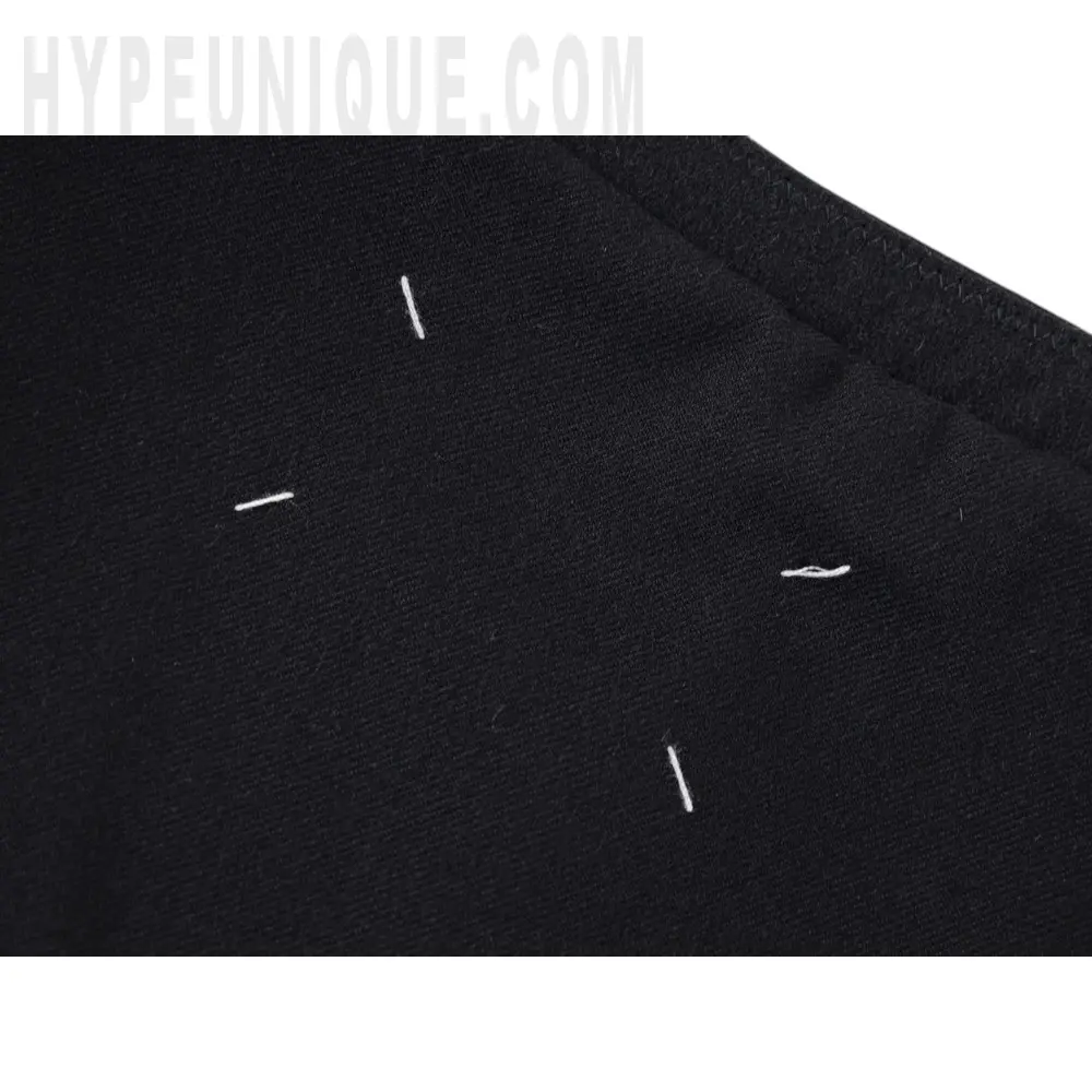 Embroidered graphic on the front of the garment