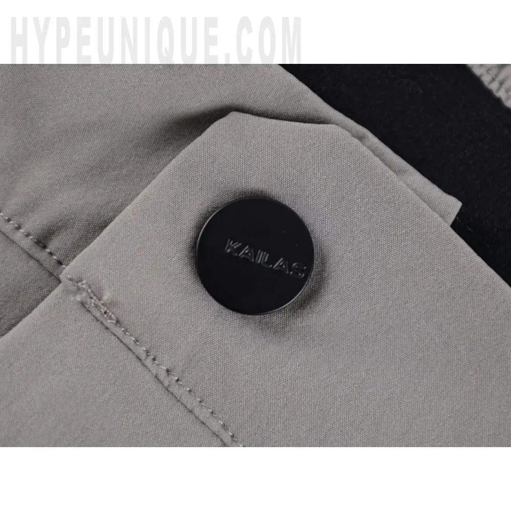 Close-up of button detail on the shorts