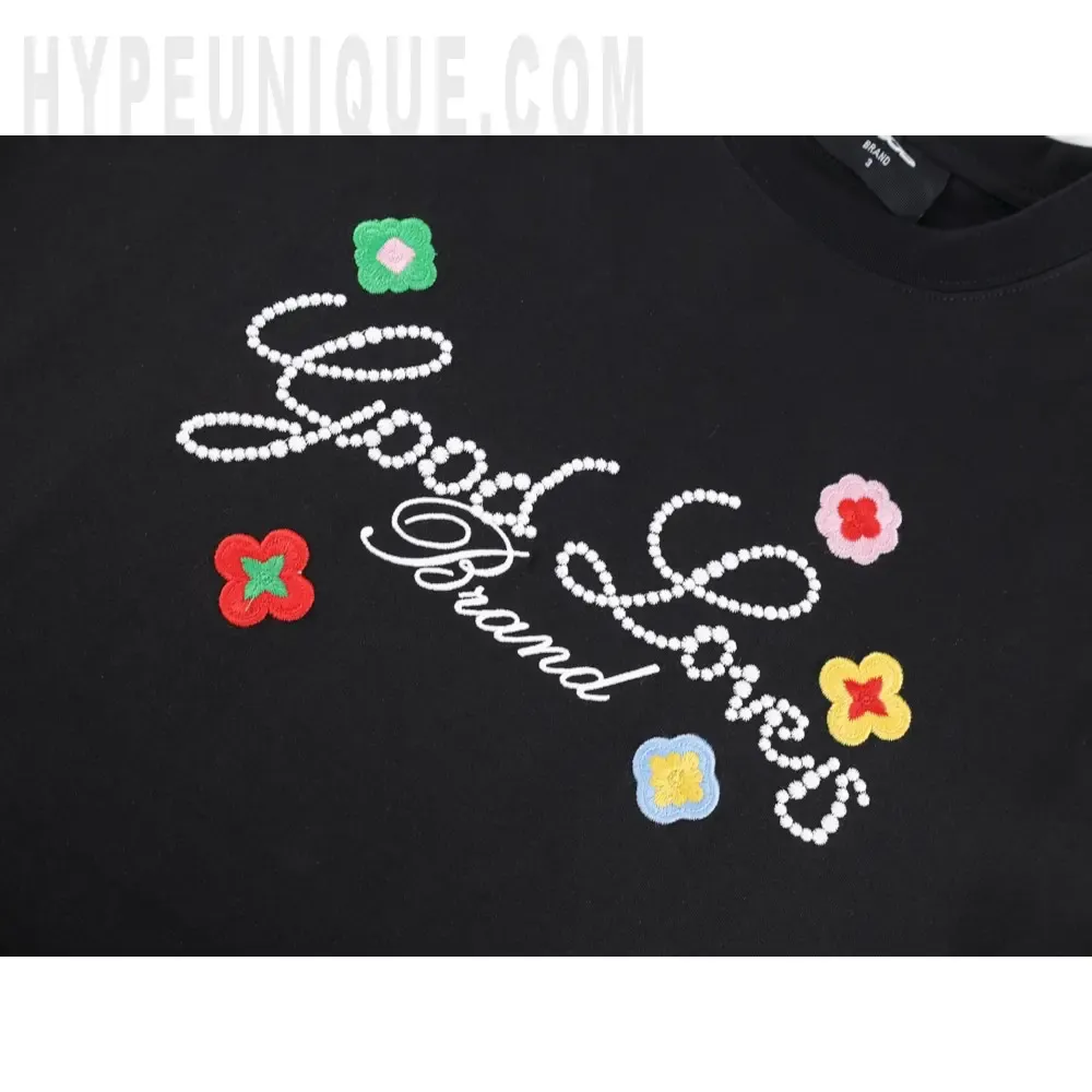 Embroidered graphic on the front of the clothes