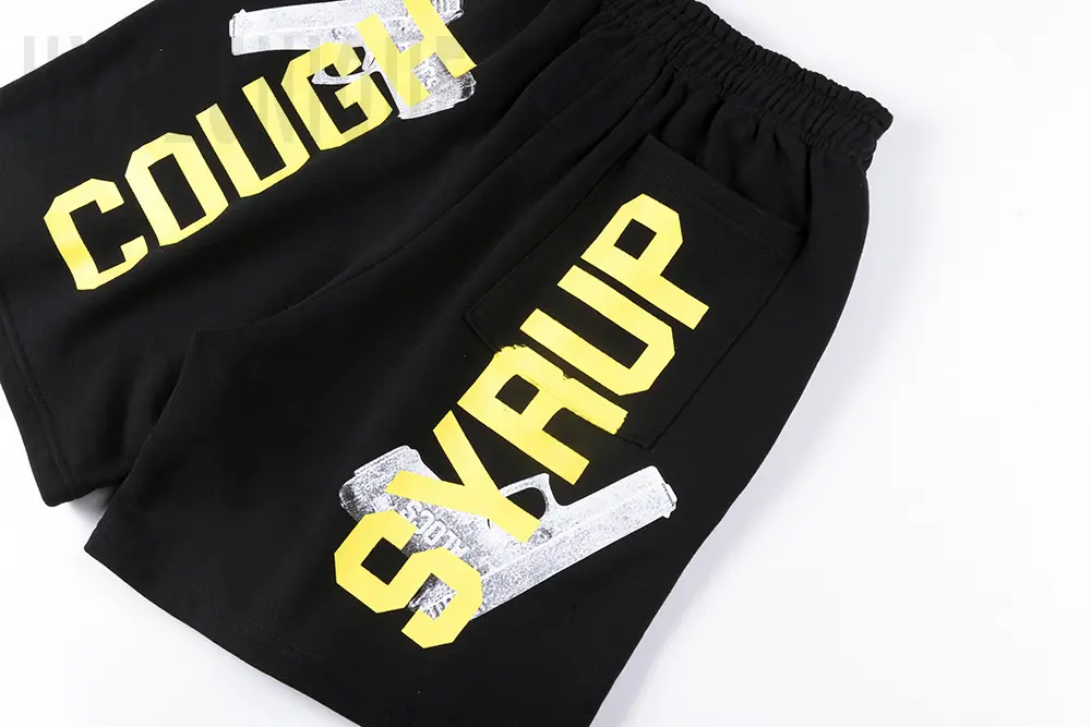 Black trouser leg with "Syrup" logo