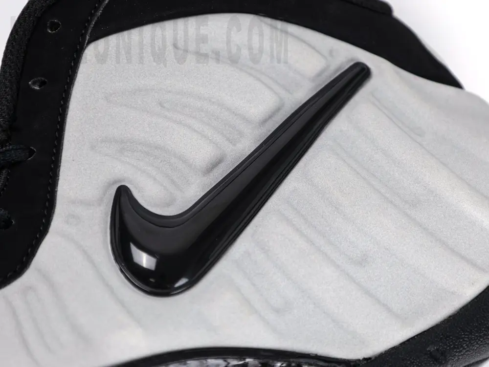 the black swoosh