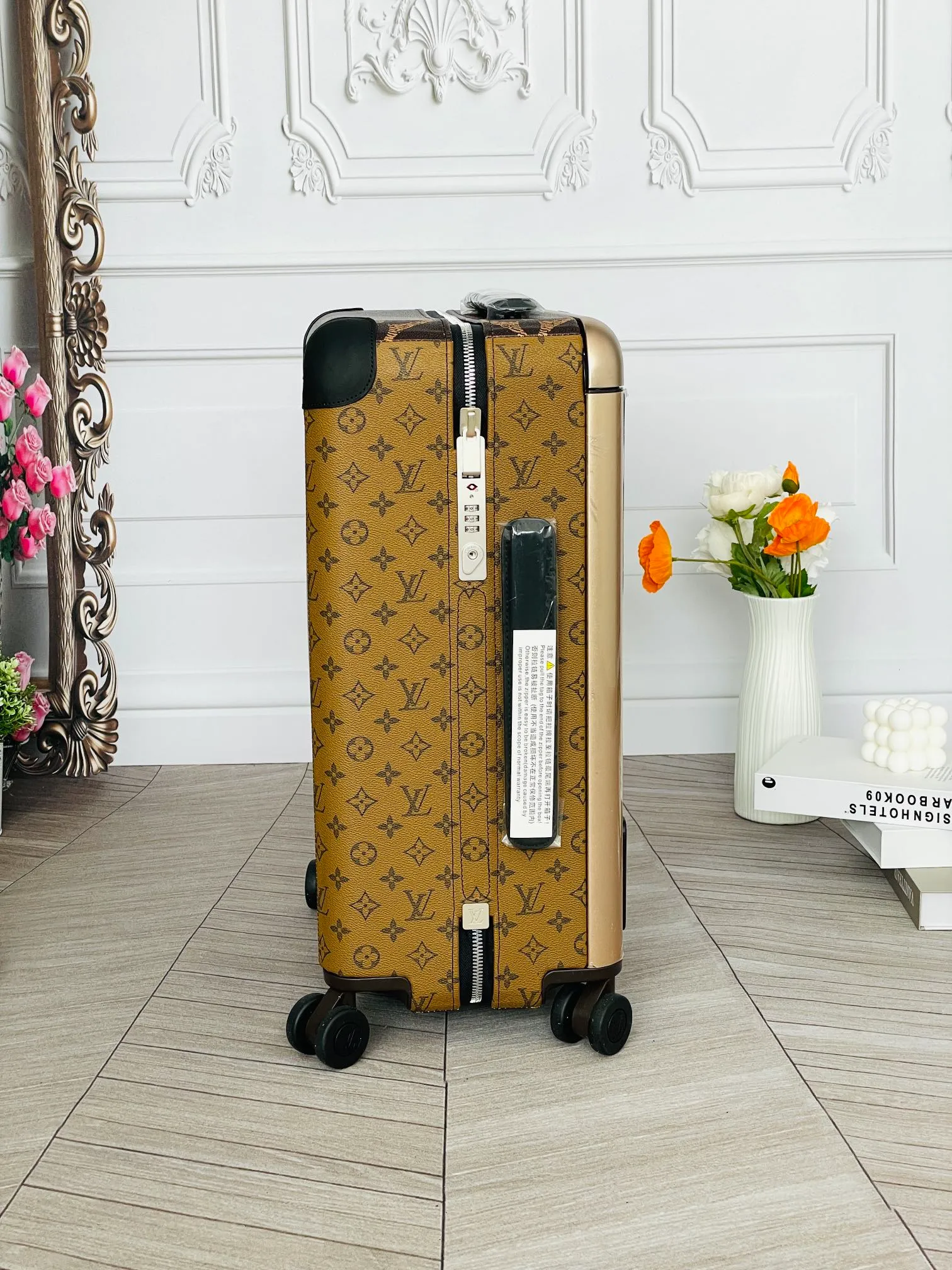 Side View Of Brown Monogram Suitcase