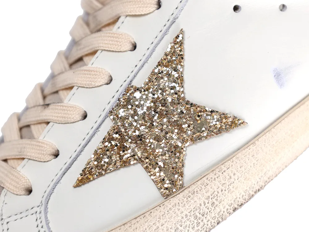 Gold glitter star detail on Golden Goose sneaker