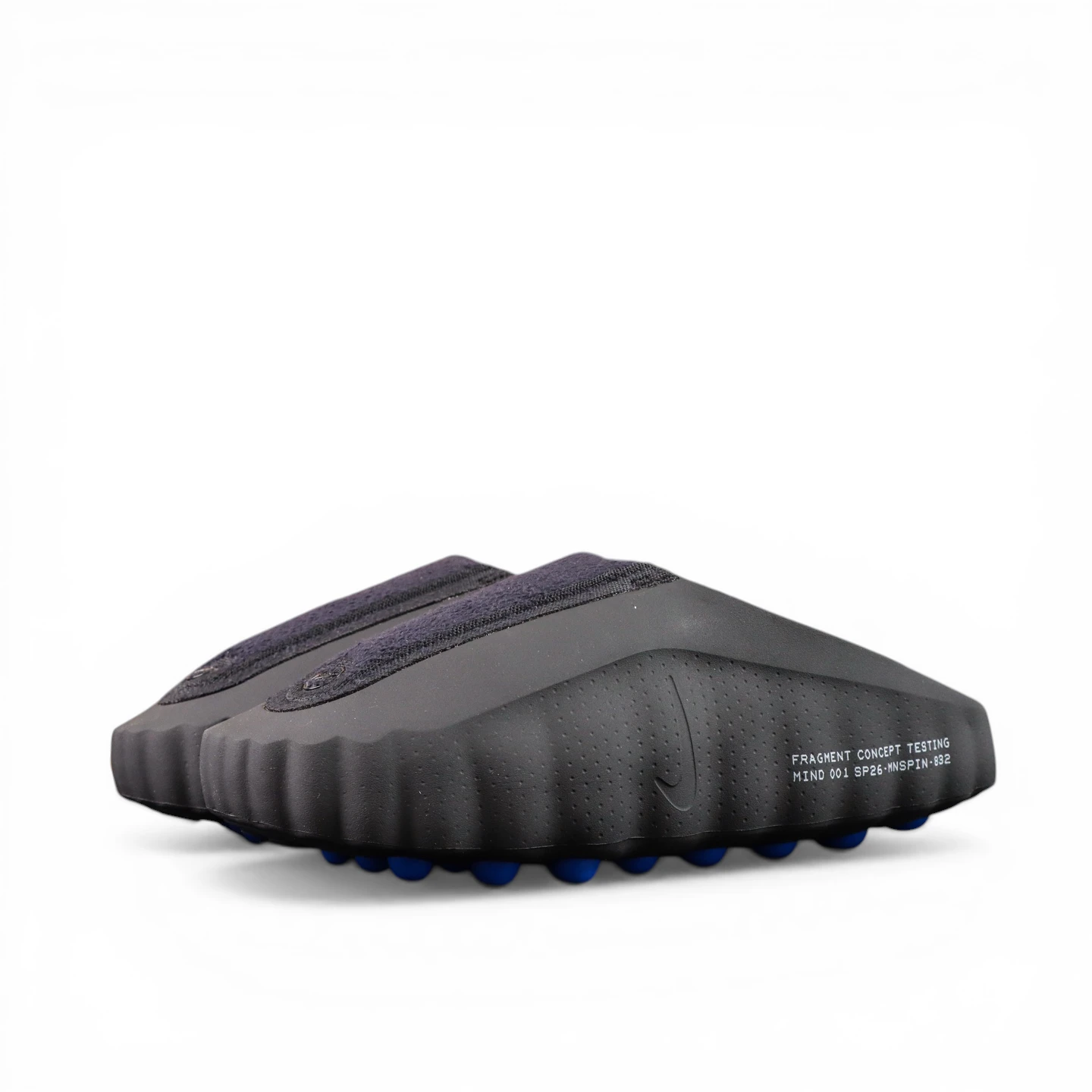 Black and blue synthetic slippers with textured sole and sleek design.