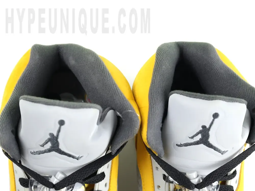 the dark grey shoe mouth