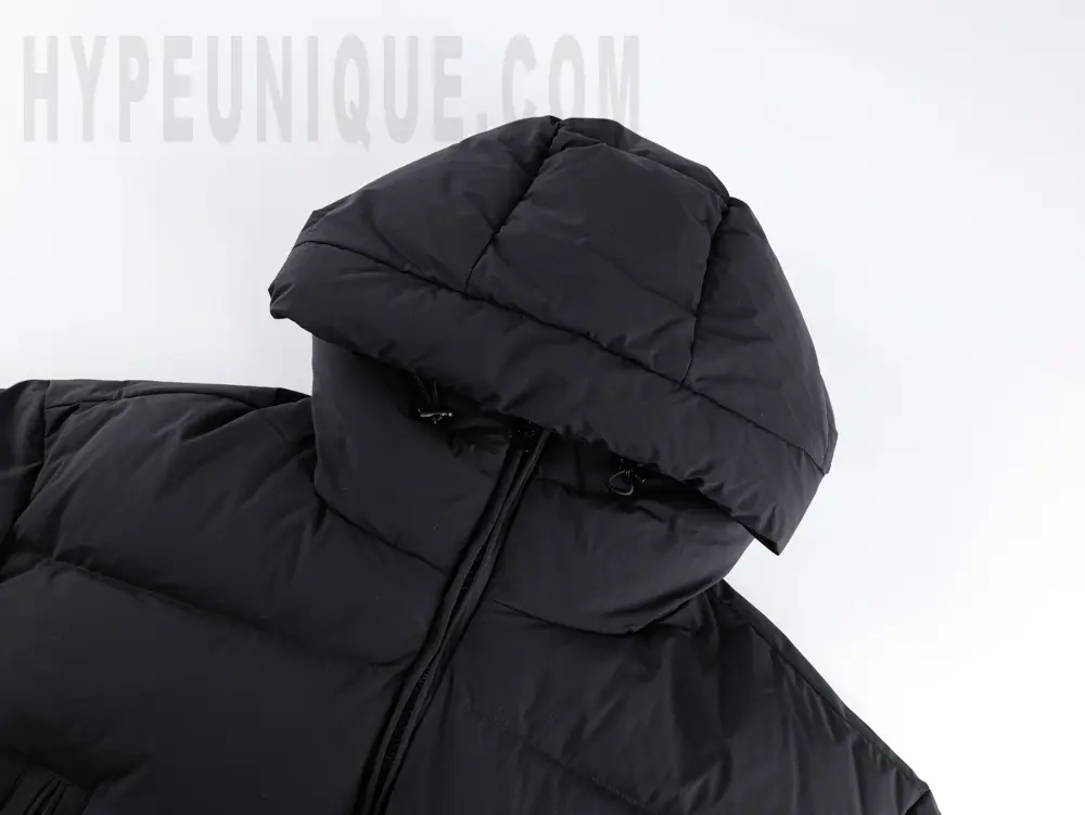 Detail of the hat of the Mlcr Bosona Down Filled Parka Jacket