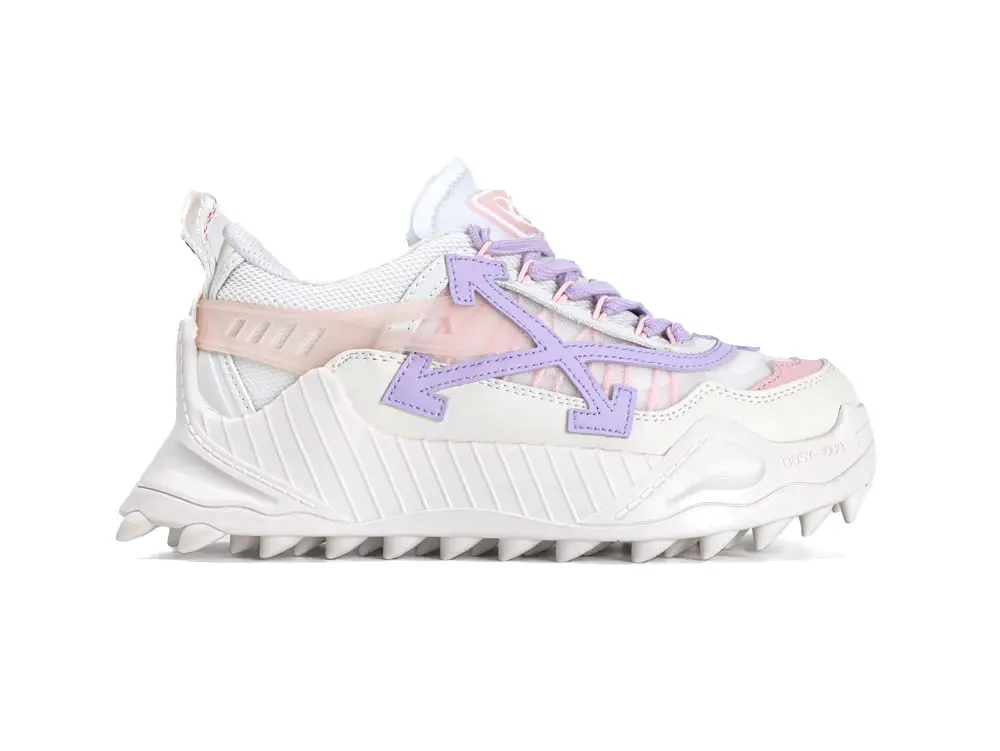 White sneaker with purple and pink accents, featuring a leather and mesh upper.