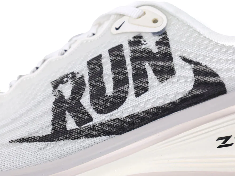 White mesh running shoe with bold black "RUN" text on the side.